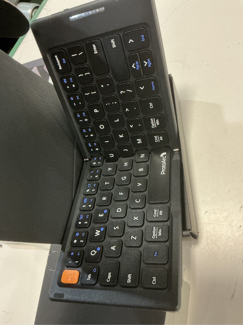 Condition photo showing Good Condition for protoarc foldable compact keyboard, xk04 portable bluetooth keyboard with pu leather cover, pocket-sized wireless travel keyboards for ipad, iphone, smartphone, tablet and laptop - black