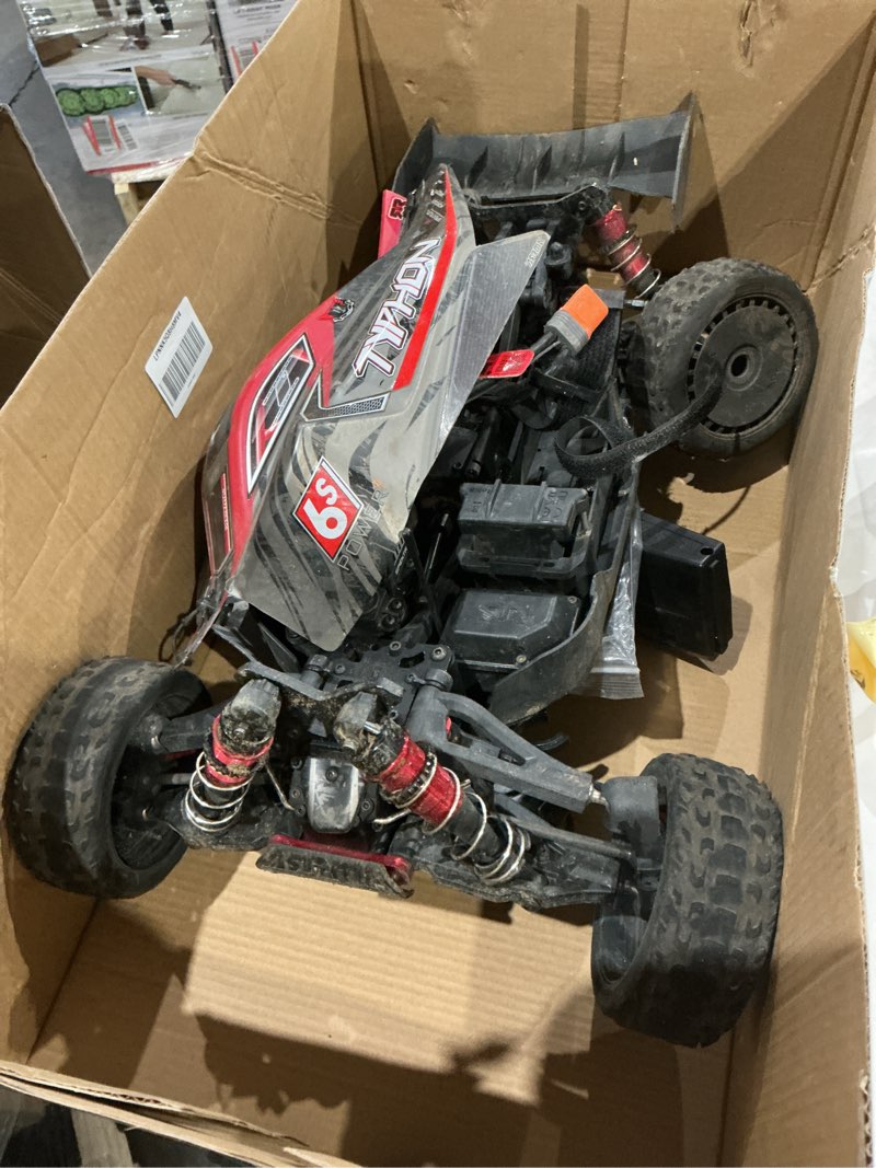 Condition photo showing As Is for arrma rc car 1/8 typhon 6s v5 4wd blx buggy with spektrum firma rtr (ready-to-run), black and red, ara8606v5