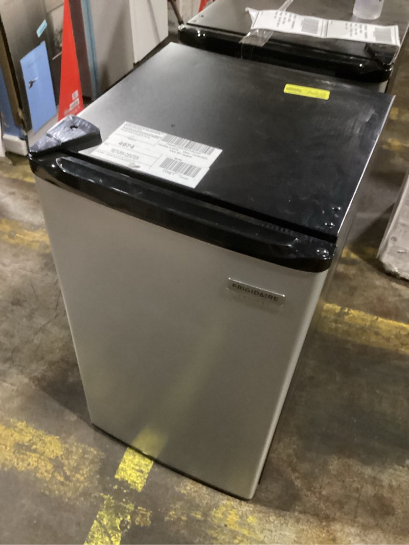 Condition photo showing Good Condition for COWSAR 3.2 Cu.Ft Dorm Fridge with Freezer, Single Reversible Door Compact Refrigerator, Adjustable Thermostat, 2 Removable Shelves, Commercial Drink Fridge for Bedroom, Office, Kitchen, Dorm, Silver Silver 3.2 Cu.Ft
