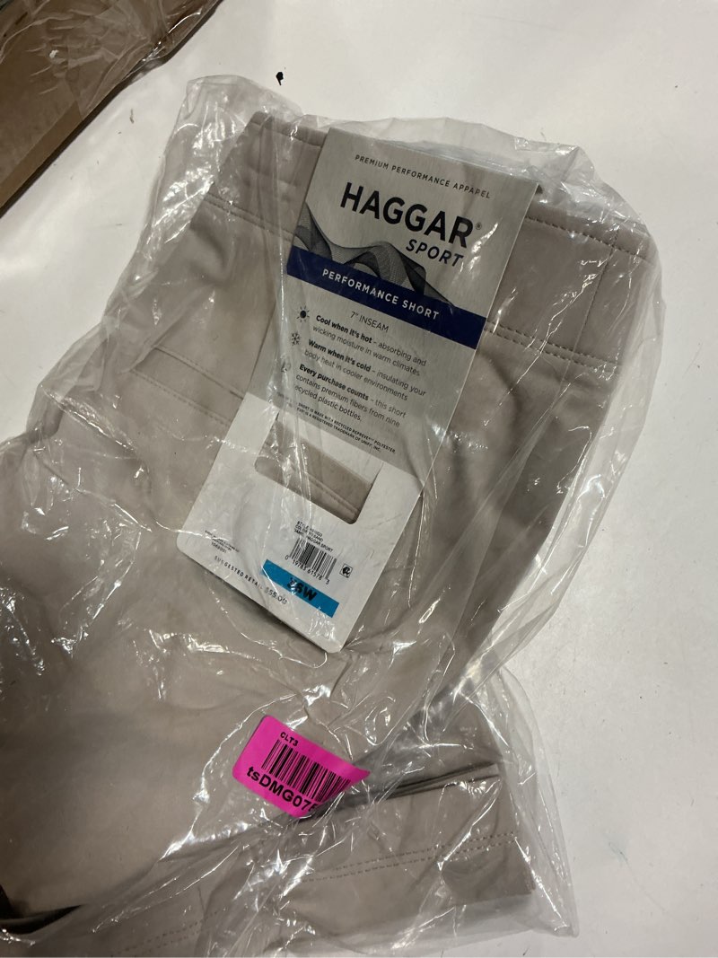Condition photo showing New/Like New for haggar mens sport travel performance short - 7 and 9 inch inseam 7" 36 regular sand
