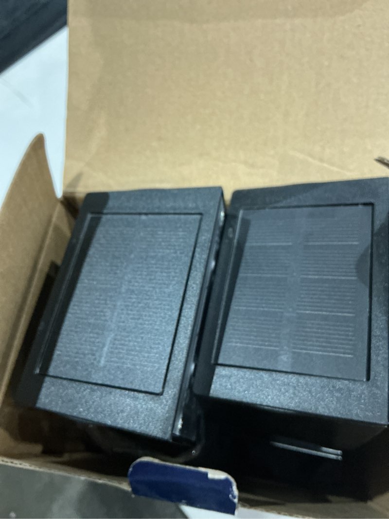 Condition photo showing As Is for harbor breeze solar matte black led outdoor wall light kit 2 -pack