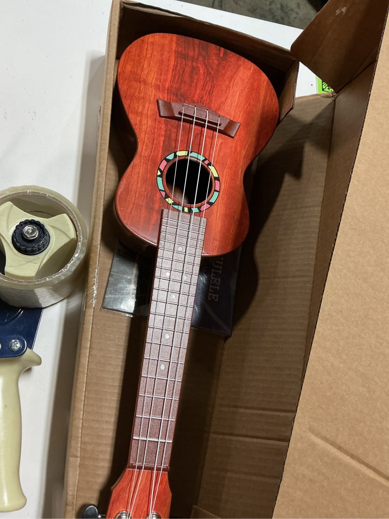 Condition photo showing Good Condition for Raimy Kids Guitar Ukulele - 21in Ukulele Guitar Toys for Kids Ages 3 4 5 6 7+ Year Old Boys Girls Simulated Sound Quality Music Instruments Learning Education (Brown) Rosewood