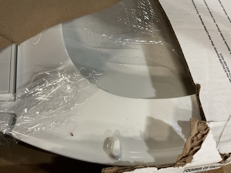 Condition photo showing As Is for kohler 20110-0 brevia, slow close toilet seat, elongated toilet seat, grip-tight bumpers quick-attach hardware, white white elongated quiet-close