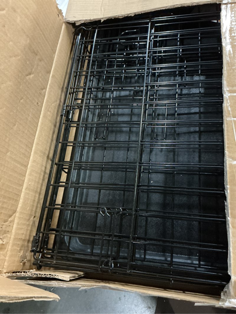 Condition photo showing Good Condition for Amazon Basics Portable Metal Wire Dog Crate with Removable Tray, Single Door with Divider Panel, Foldable, Collapsible, Easy to Assemble & Clean, 36" x 23" x 25", Black 36 x 23 x 25 in Single Door w/ Divider