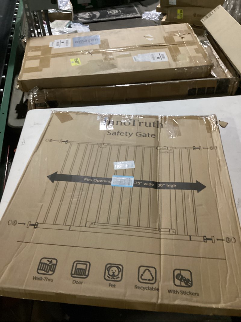 Condition photo showing New/Like New for innotruth 29.5–40.75" baby gate for stairs, 30" tall dog gates for doorways & hallways, safety gate for kids & pets, pressure-mounted walk-through with dual lock & 2-way swing, black black 1?29.5-40.75" w x 30" h