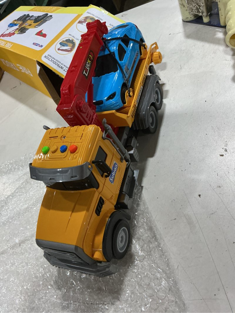 Condition photo showing Good Condition for niplooow kids toys for 3 4 5 6 7 years old boys, tow truck toy,friction powered transport truck crane vehicle toy with lights and sounds,birthday gifts for boys girls