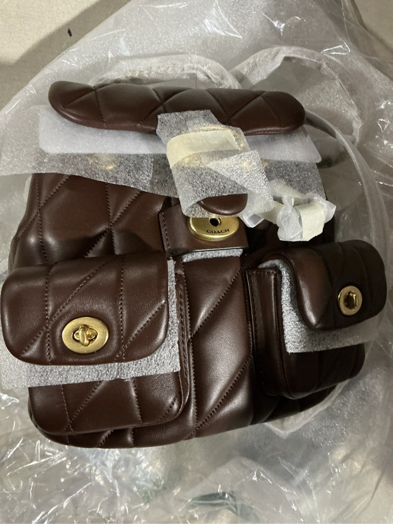 Condition photo showing Good Condition for coach women's quilted leather tabby backpack maple one size