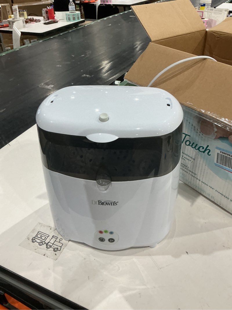 Condition photo showing As Is for dr. brown’s deluxe electric sterilizer for baby bottles and other baby essentials