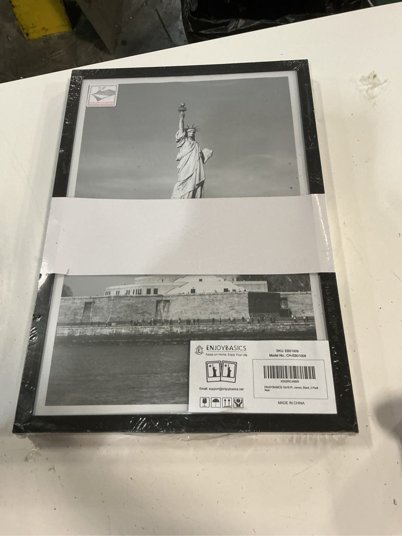 Condition photo showing New/Like New for enjoybasics 12x18 picture frame, wall gallery frames set of 2, black | fit 12 x 18 posters, horizontal or vertical hanging, gift for family, wedding, christmas, wall decor for dorm
