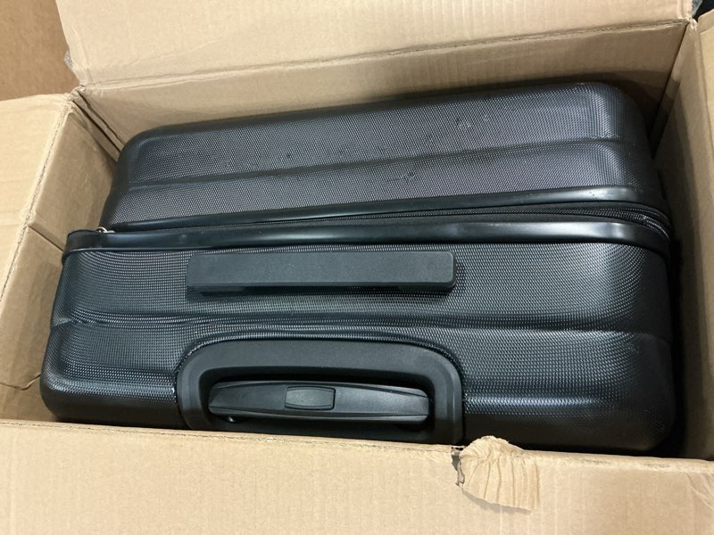 Condition photo showing Good Condition for Amazon Basics 30" Hardside Large Checked Luggage, Hardshell Suitcase With Wheels, Expandable For Up to 15% More Space, With Scratch-Resistant Surface, Four Multi-directional Wheels, Black Black Large Checked