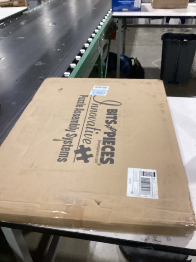Condition photo showing New/Like New for Bits and Pieces Lightweight Jigsaw Puzzle Board with Drawers, 30" x 23" - 3.5 Pounds Low Weight Felt Portable Puzzle Board - 4 Piece Sorting Trays - Standard 1000 Piece Size