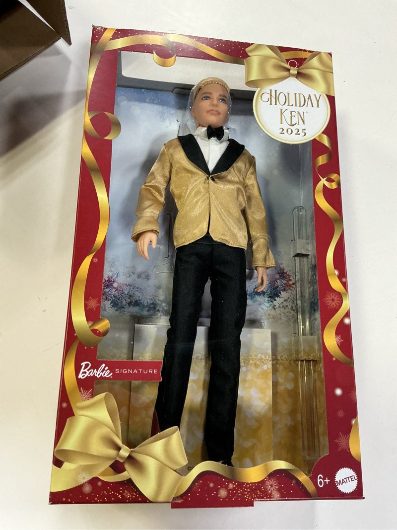 Condition photo showing Good Condition for Barbie Signature 2025 Holiday Blonde Ken Collectible Fashion Doll Wearing Full Suit with Golden Jacket in Displayable Packaging & Doll Stand Multicolor