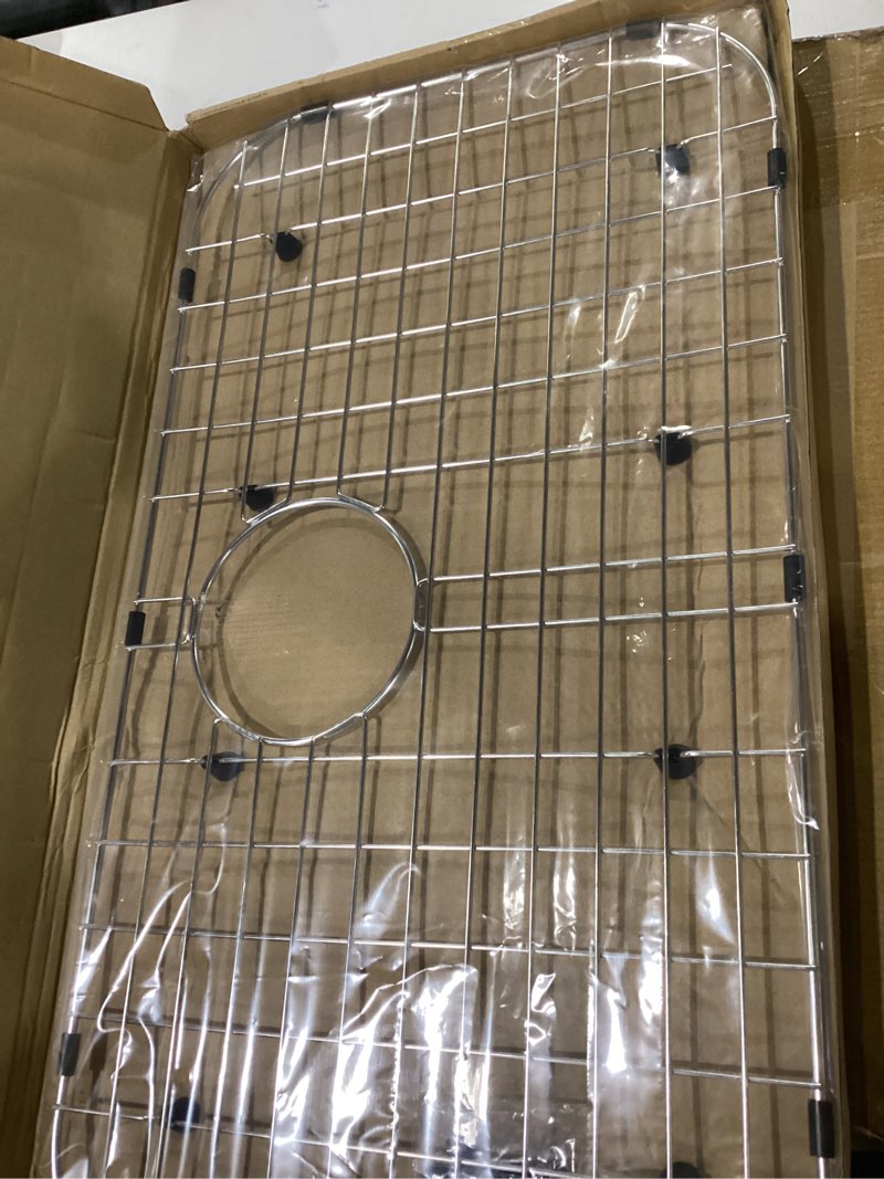 Condition photo showing New/Like New for serene valley sink protector grid 26-1/16" x 14-1/16", rear drain with corner radius 3-1/2", 304 stainless steel material nlw2614r