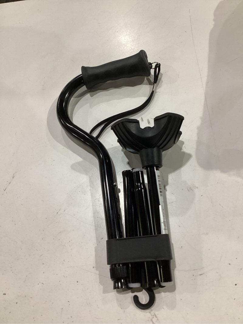 Condition photo showing Good Condition for medline offset folding cane, 4-point base with cushioned gel handle, supports up to 350 lbs, black