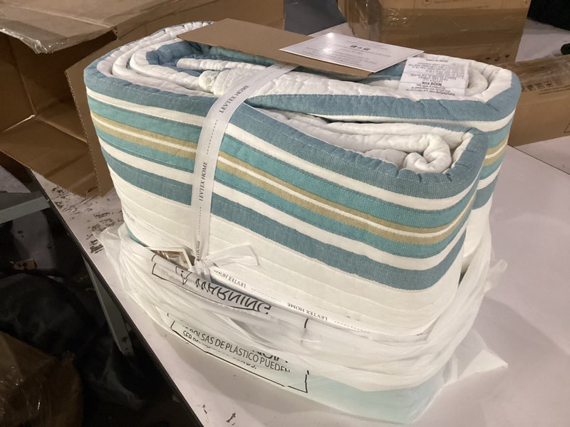 Condition photo showing Good Condition for levtex home blue maui quilt set, king/cal king quilt + two king pillow shams, striped coastal design in light blue, cream and tan, quilt size (106 x 92), pillow sham size (36 x 20), reversible, cotton