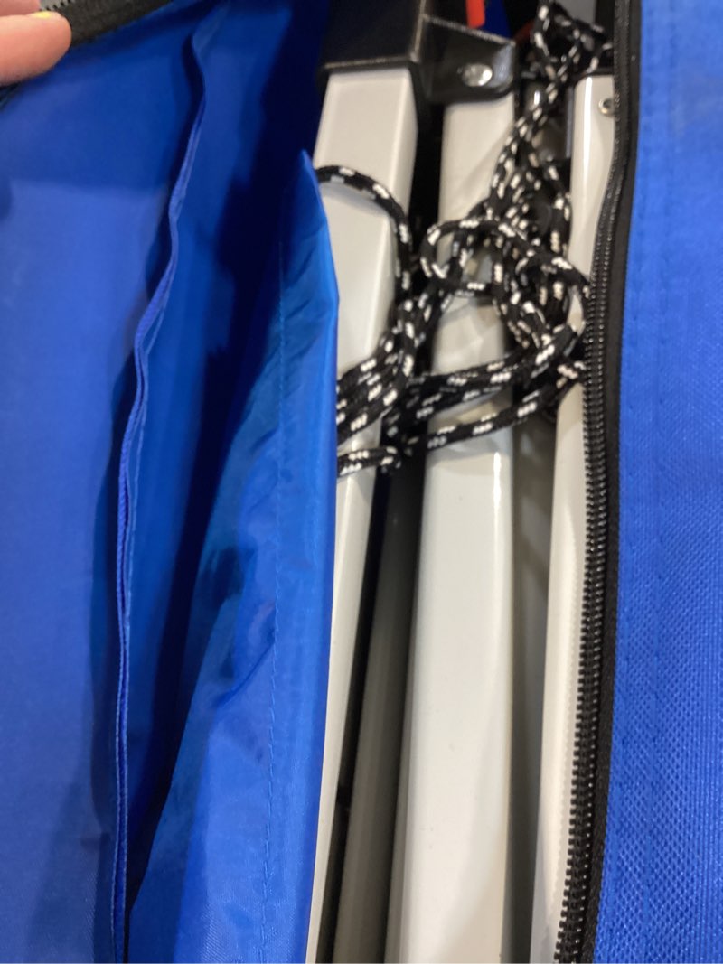 Condition photo showing As Is for ozark trail 10' x 10' instant slant leg pop-up canopy tent, blue