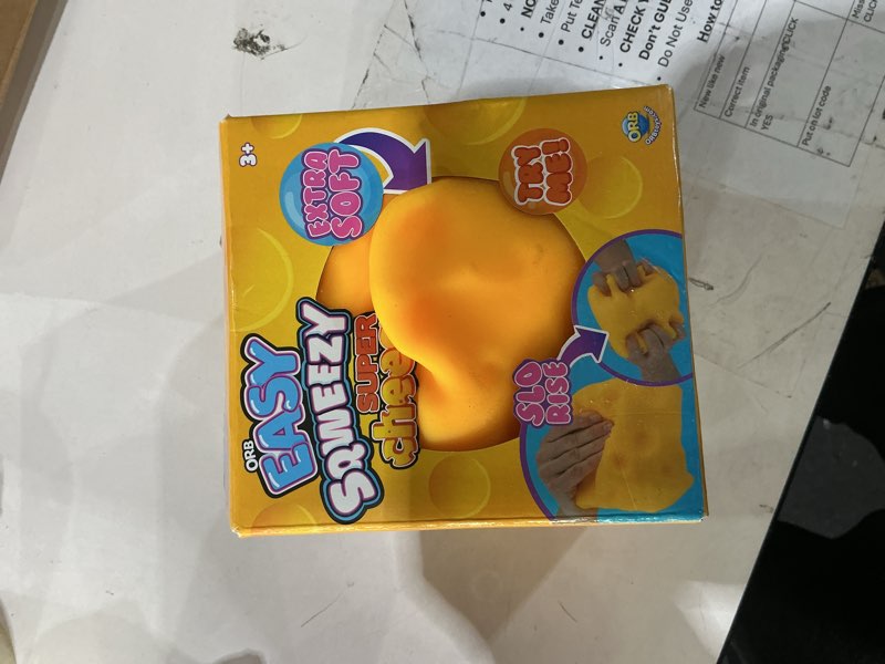 Condition photo showing Good Condition for orb easy sqweezy super cheesy - squeeze this big, fun, squishy, slow rising, extra soft giant block of cheese for stress relief - original sensory / fidget novelty toy and gift for kids and adults