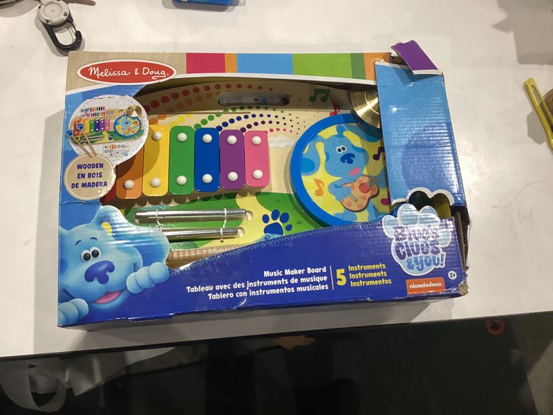 Condition photo showing New/Like New for Melissa & Doug Blue's Clues & You! Wooden Music Maker Board (5 Instruments)