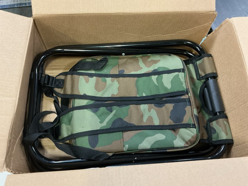 Condition photo showing As Is for Kikerike Folding Stool Backpack Insulated Cooler Bag, Collapsible Camping Hunting Fishing Multifunction Chair with Front Pocket and Bottle Pocket for Outdoor Events, Hiking, Travel, Beach Camouflage