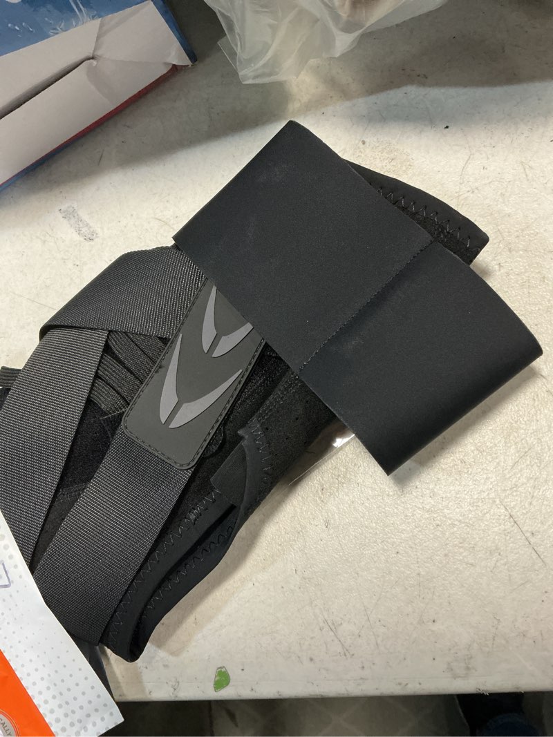 Condition photo showing New/Like New for slim-fit ankle brace for sprained ankle, quick lace up ankle support for women men with 2 auto-shaped pads, air fabric cool ankle stabilizer for injury recover, running,sports, xl(14”-15”) black xl(ankle size:14"-15")