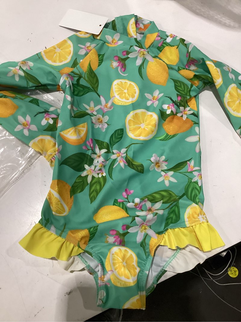 Condition photo showing Good Condition for baby toddler girl long sleeve ruffle swimsuit one piece zipper rash guard bathing suit with upf 50+ sun protection green lemon 4-5t