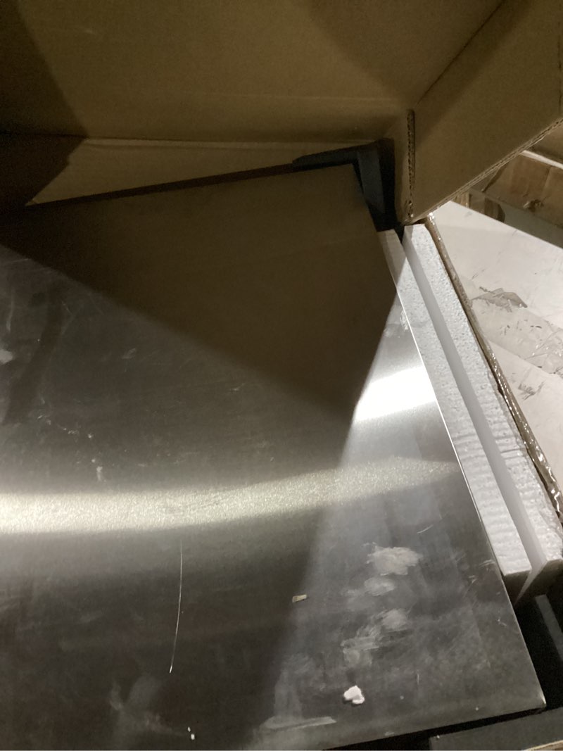 Condition photo showing As Is for mophorn 24x18x34 inch stainless steel work table 3-stage adjustable shelf with 4 wheels heavy duty commercial food prep worktable with brake for kitchen prep work 24*18*34in with caster worktable