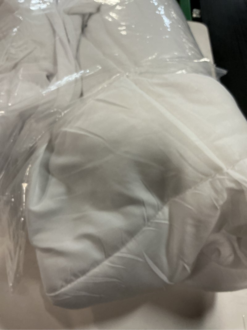 Condition photo showing As Is for Amazon Basics Hypoallergenic Quilted Mattress Topper Pad, 18 Inches Deep, Twin, White