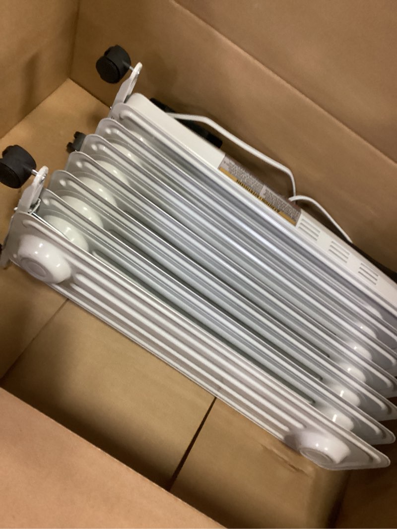 Condition photo showing As Is for 714PG Essentials Freestanding 7-Fin Oil-Filled Radiator with Timer 1500W