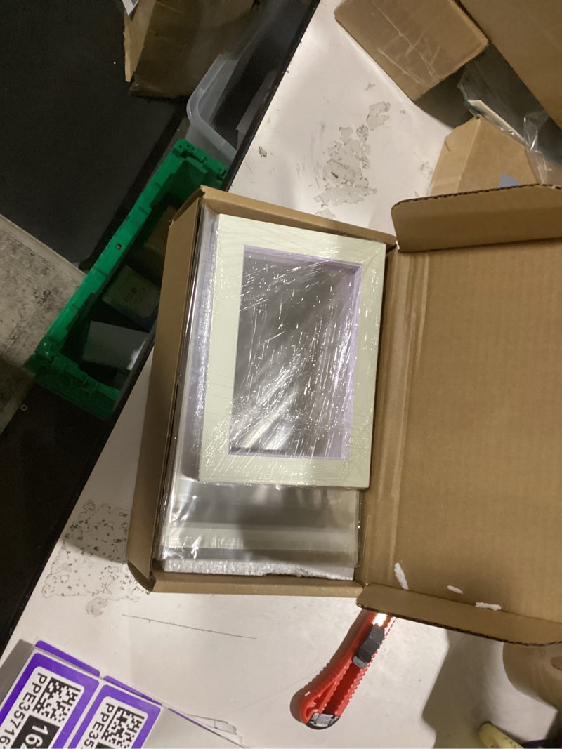 Condition photo showing As Is for acid free 25 pack 5x7 pre-cut mat board show kit for 4x6 photos, prints or artworks, 25 core bevel cut matts and 25 backing boards and 25 crystal plastic bags, white 5x7 for 4x6