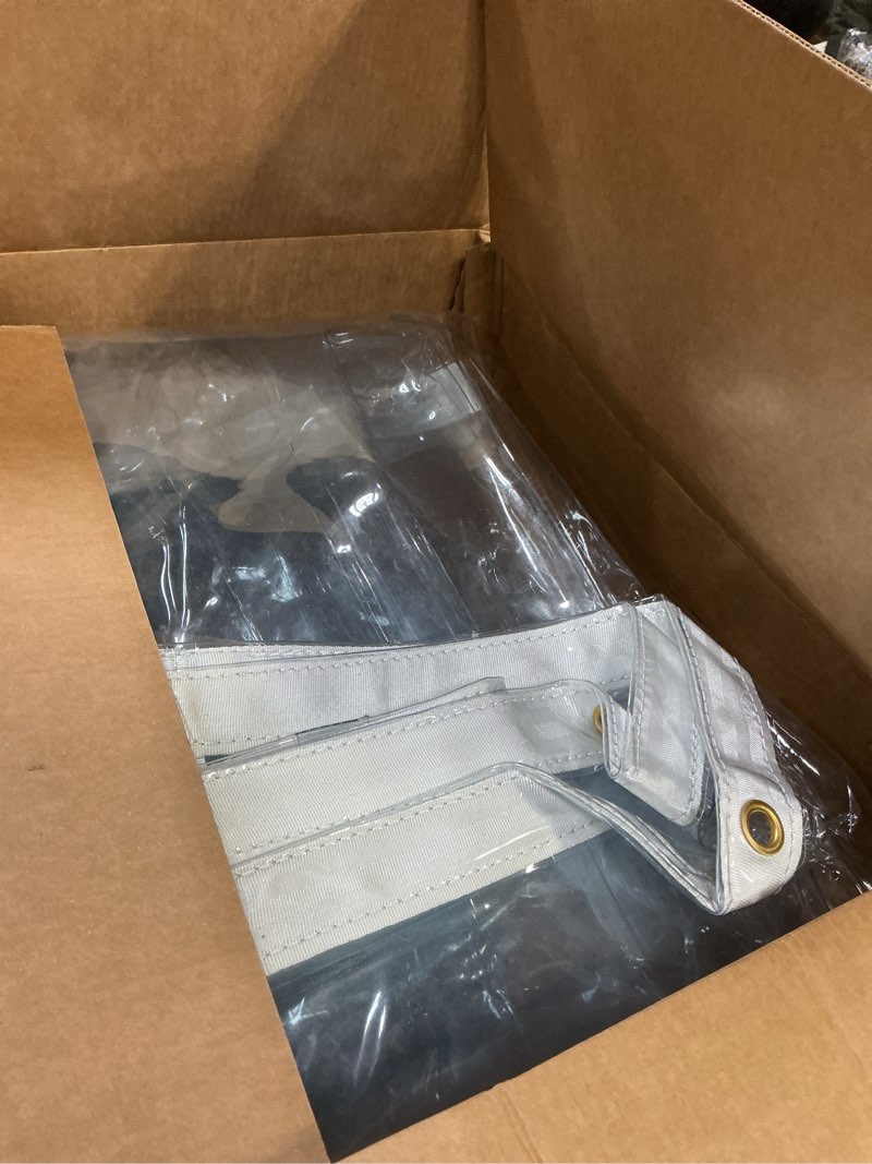 Condition photo showing As Is for 6' x 10' Clear Vinyl Tarp - Super Heavy Duty 20 Mil Transparent Waterproof PVC Tarpaulin with Brass Grommets - for Patio Enclosure, Camping, Outdoor Tent Cover, Porch Canopy - by Xpose Safety 20 Mil 6 Feet x 10 Feet