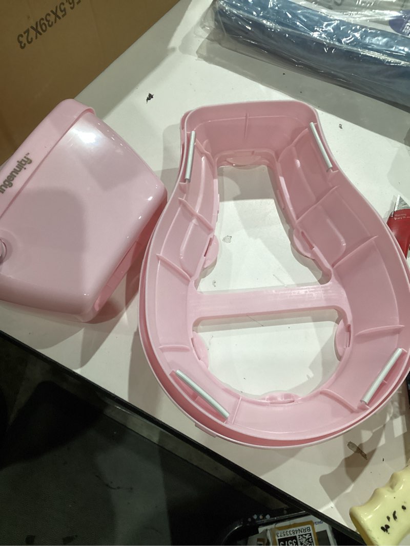 Condition photo showing As Is for ingenuity my size potty pro in pink, infant potty training toilet, lifelike flushing sound, for ages 18 months, up to 50 pounds