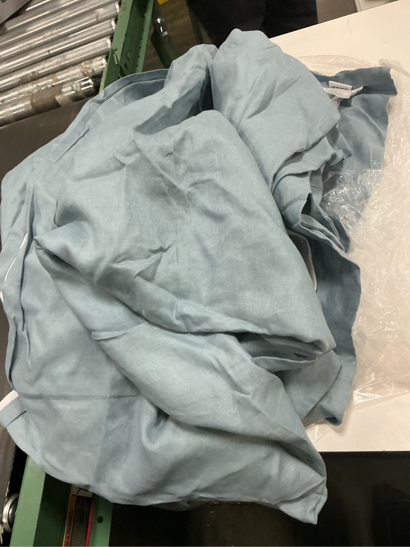 Condition photo showing As Is for quince european linen room darkening curtain - single panel light blue 96*96 inc 