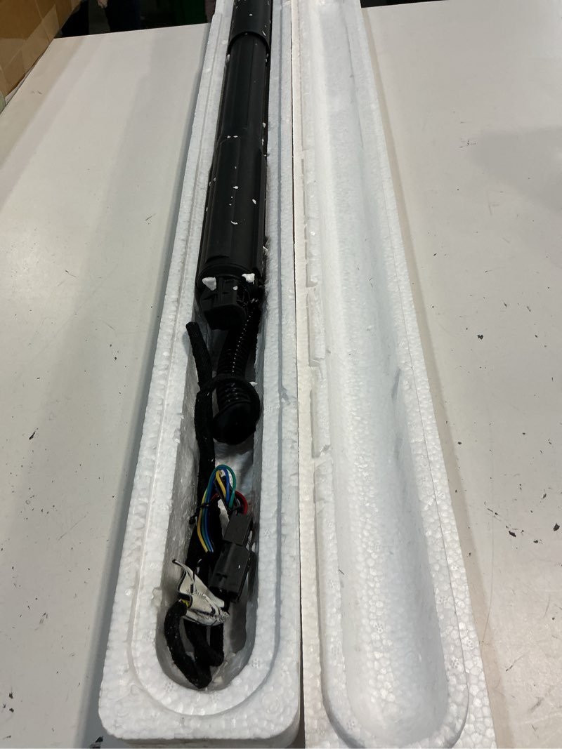 Condition photo showing As Is for rear left tailgate power lift support shock strut  2019 2020 2021 2022 202