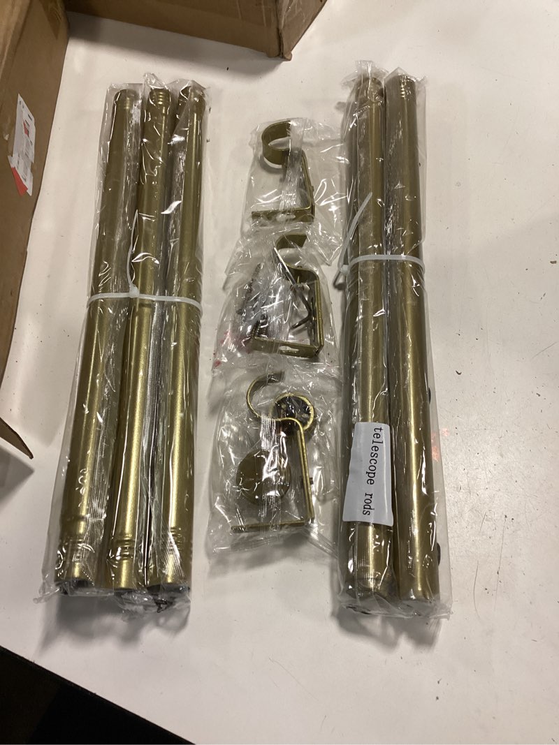 Condition photo showing New/Like New for gold curtain rod