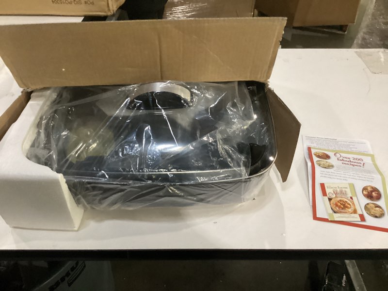 Condition photo showing As Is for not tested**** presto 06857 16-inch electric foldaway skillet, black