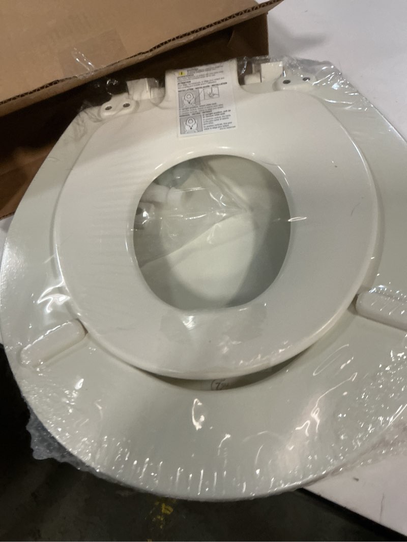 Condition photo showing New/Like New for mayfair nextstep2 toilet seat with built-in toddler potty training seat, slow close, easy clean, magnetic removable kids seat, round, biscuit biscuit round