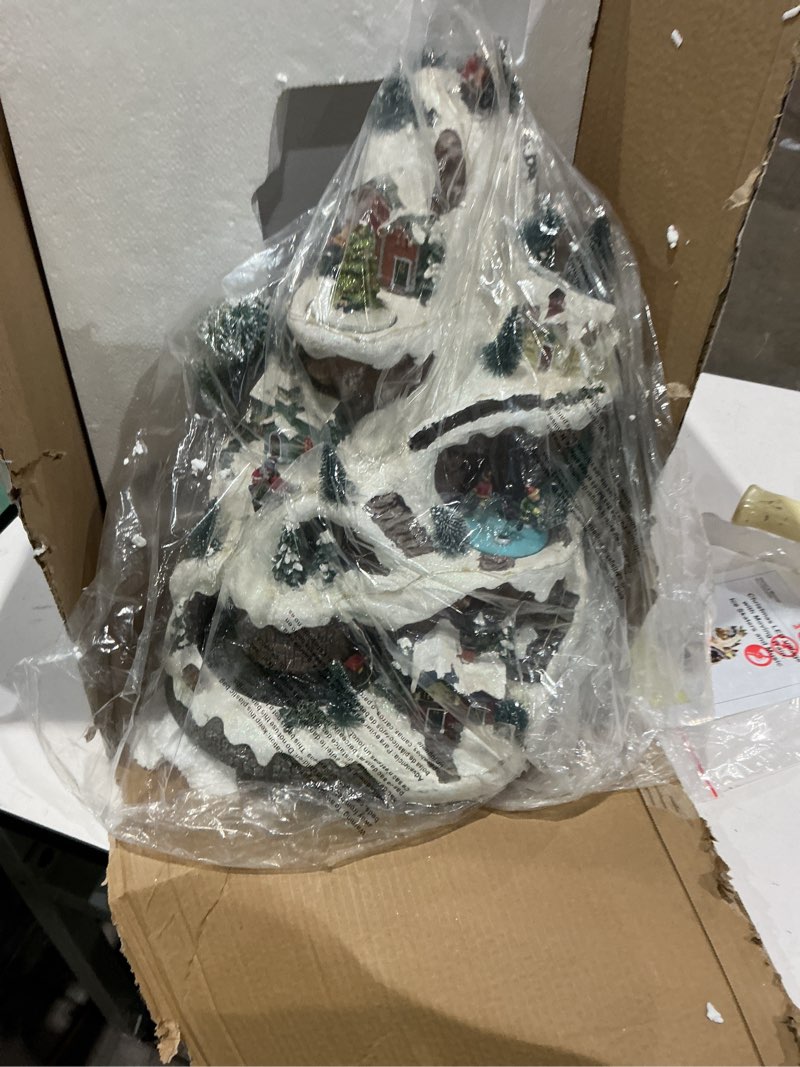 Condition photo showing As Is for alpine corporation 18" tall indoor animated winter wonderland set with 75 led lights, music, moving train, tabletop christmas decoration mountain village