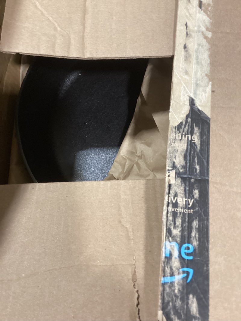 Condition photo showing As Is for Lodge 12 Inch Cast Iron Skillet with Red Silicone Hot Handle Holder – Pre-Seasoned Frying Pan for Stove, Oven, Grill & Campfire – Made in the USA – Durable, Nonstick Cast Iron Cookware – Black 12 inch + Hot Handle Holder