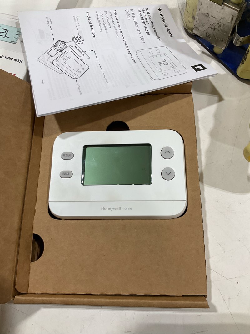 Condition photo showing As Is for honeywell home x1n heating and cooling push button non-programmable thermostat