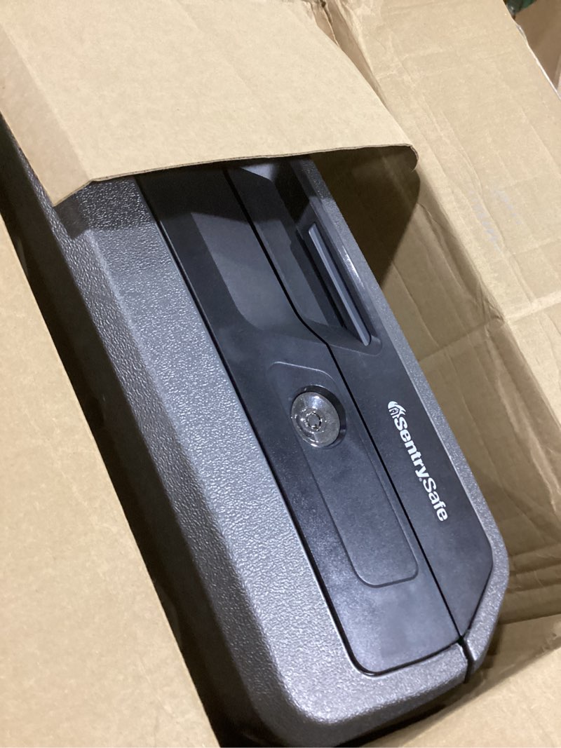 Condition photo showing Good Condition for SentrySafe Dark Gray Fireproof and Waterproof Safe with Key Lock, Chest Lock Box with Carrying Handle for Travel, 0.28 Cubic Feet, 6.6 x 15.4 x 14.3 Inches, CFW20201 1 Hr. Fireproff, No lid Straps