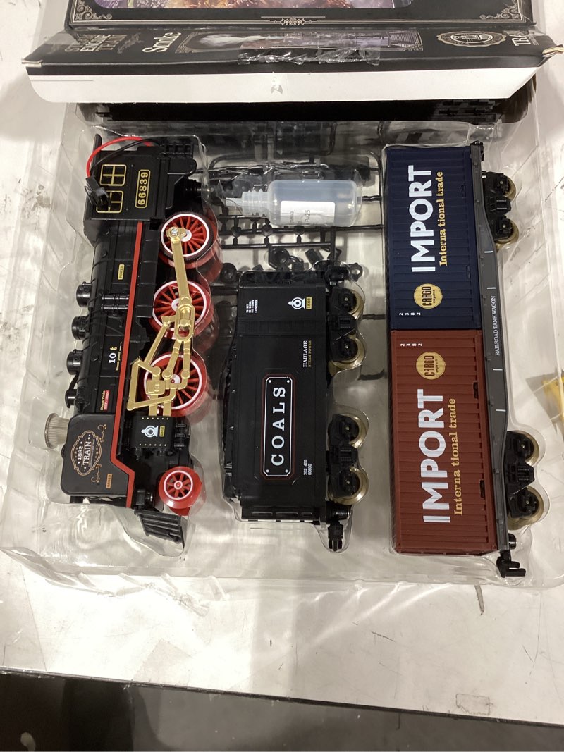 Condition photo showing Good Condition for Funwee Train Set for Under Christmas Tree,Electric Train Toy with Smokes,Lights and Sound, Locomotive Train Model with Track,Birthday Gifts Idea for 3 4 5 6 7+ Years Old Toddler Boys and Girls