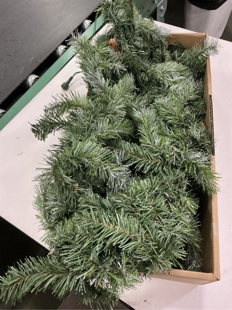 Condition photo showing As Is for 6030489 holiday 9ft madison pre-lit garland