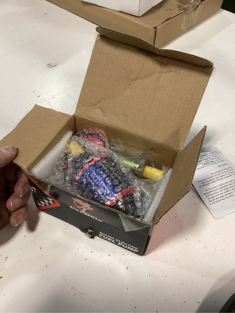 Condition photo showing New/Like New for carbole micro electric gasoline fuel pump universal 5/16 inch inlet and outlet 12v 1-2a 35gph 4-7 p.s.i. operating fuel pressure 35gph 4-7psi for gasoline
