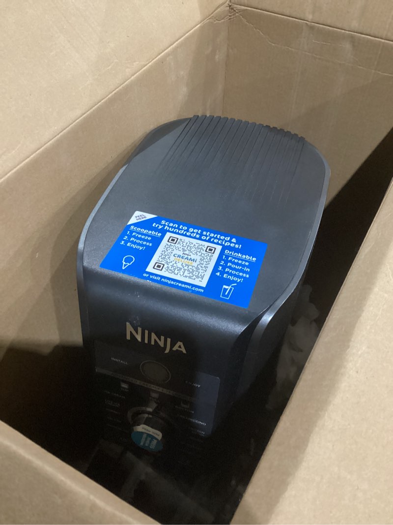 Condition photo showing As Is for ninja creami deluxe ice cream maker, treats and frozen desserts, sorbet, milkshakes, yogurt and more, 11-in-1 programs, xl capacity, includes two 24-oz family-size tubs, silver, nc501