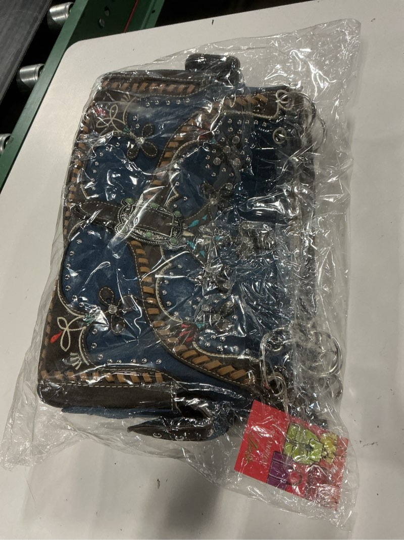 Condition photo showing New/Like New for spring moccasin floral buckle handbag