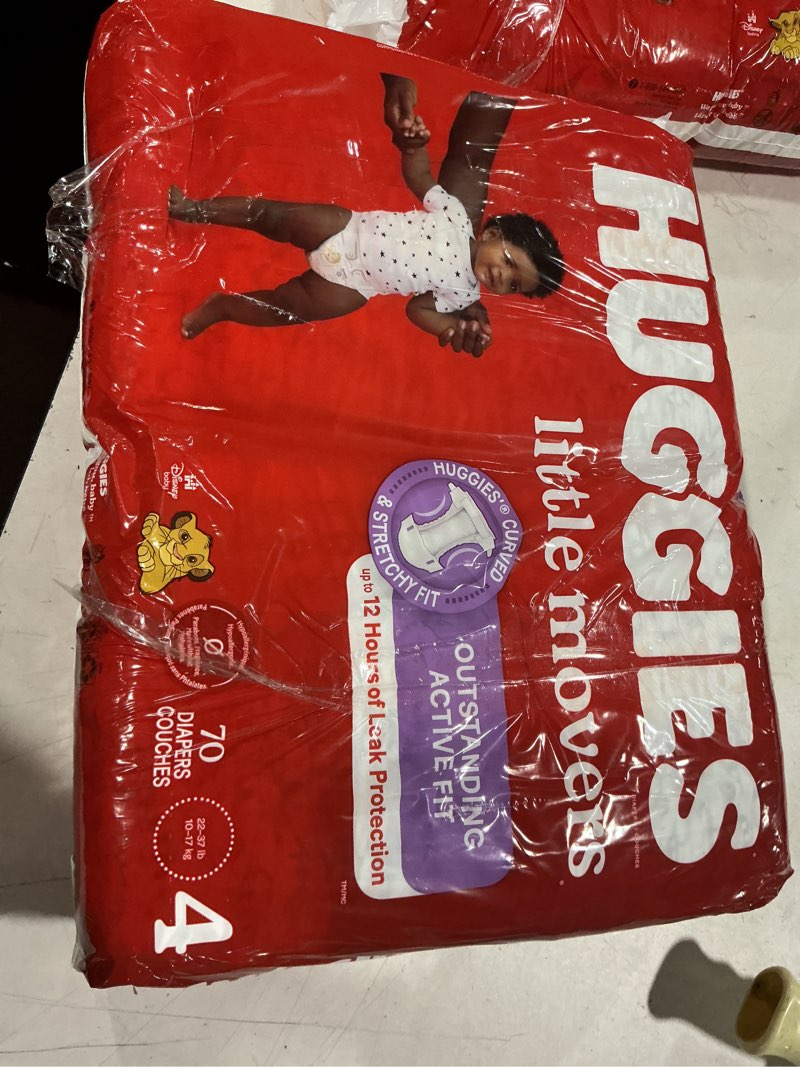 Condition photo showing Good Condition for huggies little movers 70 diapers couches size 4 (22-37 lb)(10-17 kg)