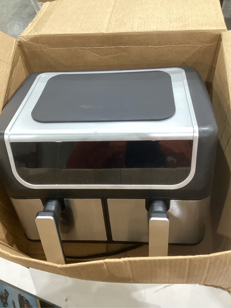 Condition photo showing As Is for ninja | air fryer | finish cooking multiple foods at the same time | 6-in-1 (air fry, broil, roast, keep warm, dehydrate, bake) | fit up to 8lb chicken wings in the two 5 qt baskets | dz302 10qt black