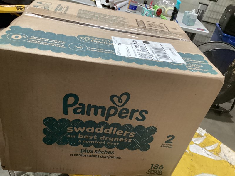 Condition photo showing As Is for pampers swaddlers diapers, size 2 (10-22 lbs), 186 count, absorbent, keeps baby dry and comfortable, skin safe disposable baby diaper (packaging may vary) size 2 186