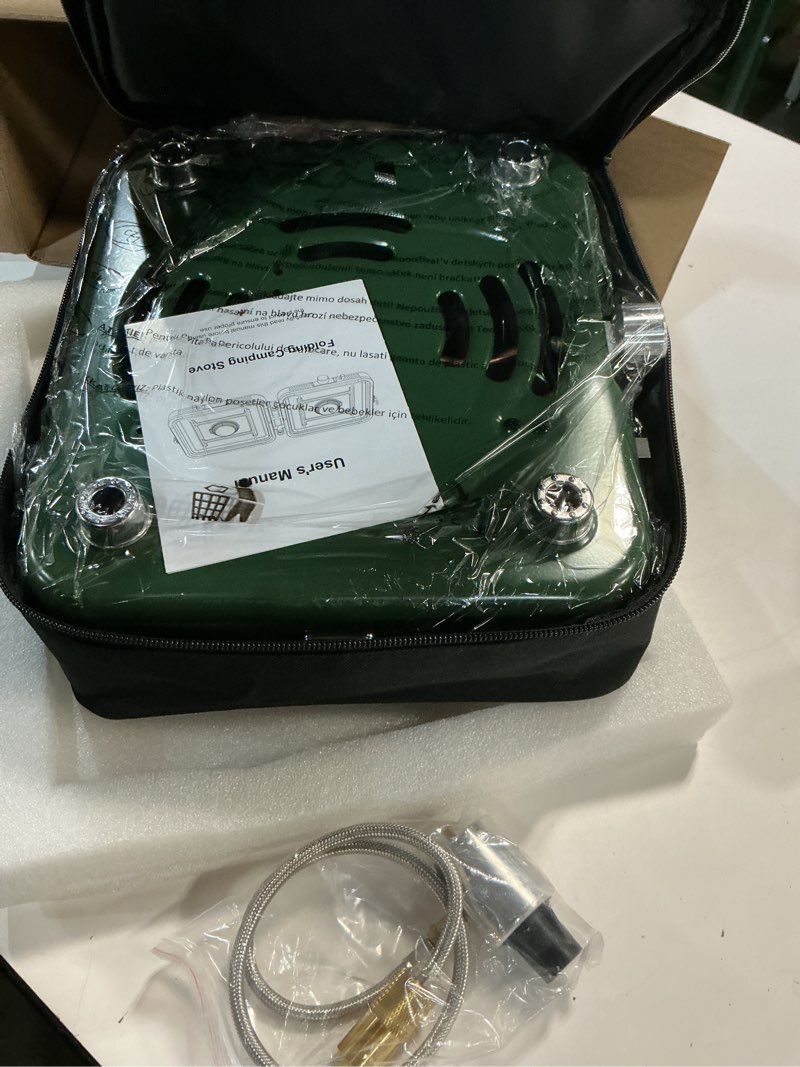 Condition photo showing Good Condition for 2-Burner Foldable Camping Stove with Griddle and Carrying Bag, Portable Propane Camp Stove with 2 Adjustable Burners & Piezo Ignition for Camping Tailgating Essentials Gear Green