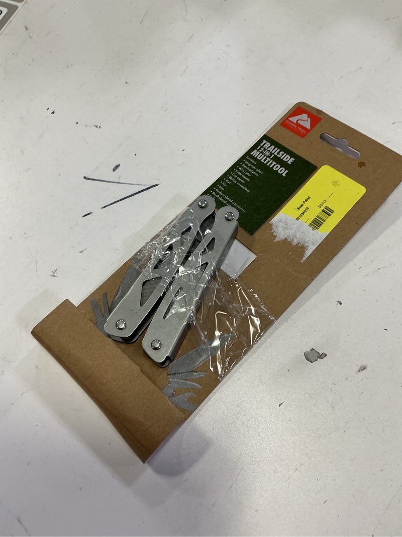 Condition photo showing As Is for ozark trail camping steel, 12-in-1 multi tool with sheath, silver, model 6962